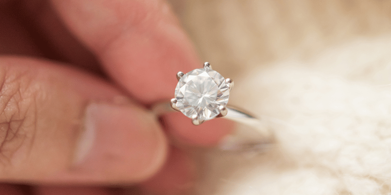 hand holding diamond ring
